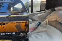 Mobil elf dan puluhan karung pupuk subsidi yang diamankan di Polres Probolinggo.