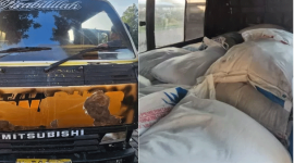 Mobil elf dan puluhan karung pupuk subsidi yang diamankan di Polres Probolinggo.