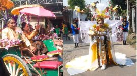 Syaiful Anam Kepala Desa Dukuh Klopo Kecamatan Peterongan bersama dengan Bu Lurah saat mengikuti karnaval bersama warga setempat. (Foto Apriani Alva)